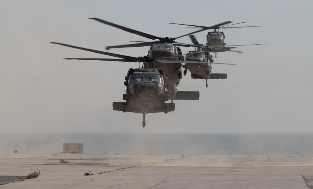 UH-60 Black Hawk helicopters carrying distinguished visitors arrive for Army Day 2018, Feb. 9, 2018, Kuwait Naval Base, Kuwait. Army Day was the opening event for U.S. Central Commandâ€™s Component Commanders Conference that allowed U.S. Army Central to showcase the Armyâ€™s capabilities at the theater level. (U.S. Army photo by Sgt. 1st Class Ty McNeeley, U.S. ARCENT PAO)