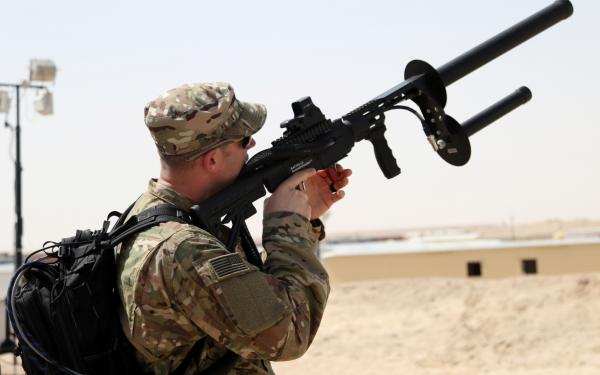 CAMP BUEHRING, Kuwait – A 1st Security Forces Assistance Brigade (SFAB) Soldier uses a Drone Defender to capture and control a drone as its flying, Mar. 6, 2018. The Drone Defender uses an electromagnetic pulse to disable its target and has a range of 600 meters. (U.S. Army photo by Mr. Brent Thacker)