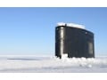 Watch a Giant Submarine Break Through the Arctic Ice as it surfaces