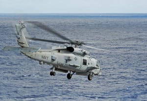 An MH-60R Sea Hawk helicopter launches from the flight deck of the aircraft carrier USS George H.W. Bush (Photo: U.S. Navy)