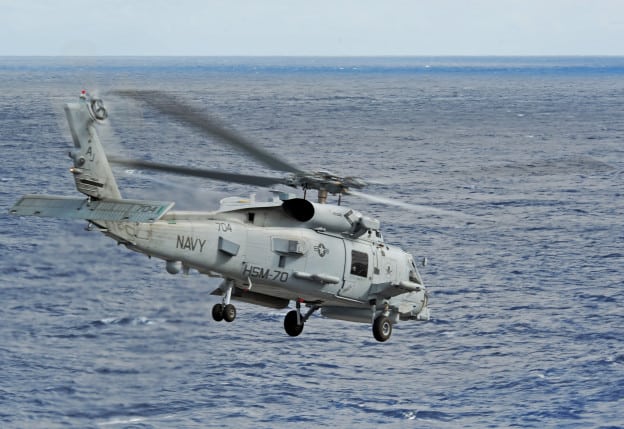 An MH-60R Sea Hawk helicopter launches from the flight deck of the aircraft carrier USS George H.W. Bush (Photo: U.S. Navy)