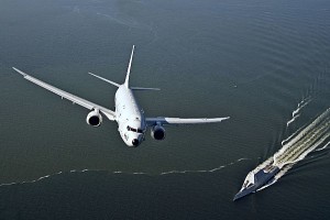 A P-8A Poseidon assigned to Air Test and Evaluation Squadron (VX) 20 flies over USS Zumwalt (DDG-1000) in Chesapeake Bay in 2016. (Photo: U.S. Navy)