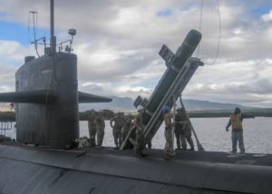 Sailors load a Harpoon anti-ship cruise missile on to the Los Angeles-class fast-attack submarine USS Olympia (SSN-717) as part of the biannual RIMPAC maritime exercise in July 2018. (Photo: U.S. Navy)