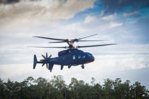 The Sikorsky-Boeing SB>1 DEFIANT™ helicopter achieved first flight March 21, 2019. With its two coaxial main rotors and rear-mounted pusher propulsor, DEFIANT is unlike production rotorcraft available today. Photo courtesy Sikorsky and Boeing.