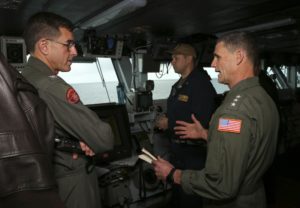 Vice Adm. Andrew Lewis, Commander, U.S. 2nd Fleet (right) speaks to Capt. Putnam Browne while embarked on the USS Abraham Lincoln (CVN-72) in the Atlantic Ocean on Feb. 1, 2019. (Photo: U.S. Navy)