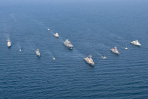 The U.S. destroyer USS Gravely (DDG-107), flagship for Standing NATO Maritime Group One, leads 11 naval ships from nine nations in close formation during a Baltic Operations (BALTOPS) 2019 photo exercise. (Photo: U.S. Navy)