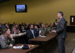 Thomas W. Harker, assistant secretary of the Navy for financial management and comptroller, presents data findings from a recent Navy full financial statement audit to installation and tenant leadership teams at Naval Air Station Jacksonville, in March 2019. (Photo: U.S. Navy)