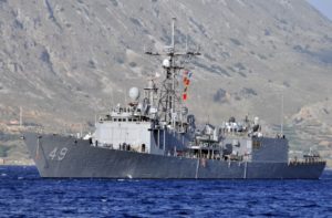 The guided-missile frigate USS Robert G. Bradley (FFG-49) conducts a berth shift during a port visit to the island of Crete on May 13, 2013. Since then the ship was decommissioned and is being refurbished and sold to Bahrain as a Foreign Military Sale. (Photo: U.S. Navy)