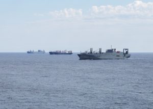 Military Sealift Command vessels, from left to right, large, medium-speed roll-on/roll-off vessel USNS Mendonca (T-AKR 303), container and roll-on/roll-off ship USNS PFC Eugene A. Obregon (T-AK 3006), and large, medium-speed roll-on/roll-off vessel USNS Gilliland (T-AKR 298), participate in a group sail during Turbo Activation in September 2019. (Photo: U.S. Navy)