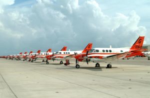 A fleet of T-44 Pegasus aircraft sit on the Naval Air Station Corpus Christi flight line in 2004. The aircraft are used to train pilots in multi-engine aircraft like the P-8 Posiedon and C-130 Hercules. (Photo: U.S. Navy)