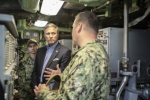 Then-Assistant Secretary of the Navy for Manpower and Reserve Affairs Gregory Slavonic talks with crew members during a tour aboard the Virginia-class attack submarine USS John Warner (SSN-785) in April 2019 (Photo: U.S. Navy)