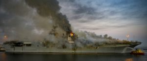 A fire continues to be fought into the evening on board USS Bonhomme Richard (LHD-6) at Naval Base San Diego, July 12. (Photo: U.S. Navy)