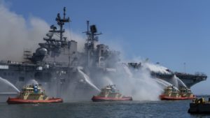 Port of San Diego Harbor Police Department boats combat a fire on board USS Bonhomme Richard (LHD-6) at Naval Base San Diego, July 12. (Photo: U.S. Navy)