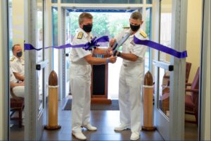 Vice Adm. Andrew Lewis, commander, Joint Force Command Norfolk (JFCNF) and U.S. 2nd Fleet, alongside Rear Adm. Andrew Betton, Deputy Commander, Joint Force Command Norfolk, cut the ribbon to commemorate JFCNF's achievement of initial operational capability (IOC), Sept. 17, 2020. (Photo: Mass Communication Specialist 1st Class Theodore Green/Released, U.S. Navy) 