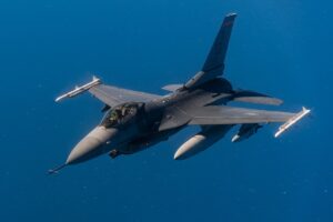 An F-16 Fighting Falcon flown by Air Force Maj. Jacob Schonig from the 416th Flight Test Squadron at Edwards AFB, Calif., conducts a captive-carry flight test with a Gray Wolf cruise missile prototype over the Pacific Ocean, June 9, 2020. (U.S. Air Force Photo)