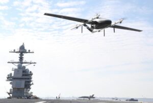 The logistics Unmanned Air System (UAS) prototype, Blue Water UAS, approaches to deliver long-weight logistical cargo on USS Gerald R. Ford’s (CVN 78) flight deck during a supply demonstration on Feb. 21, 2021. CVN-78 was in port during this test. (Photo: U.S. Navy by Chief Mass Communication Specialist RJ Stratchko)