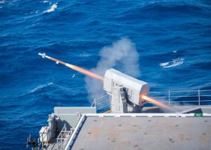 A rolling airframe missile (RAM) launcher fires a RIM-116 missile from USS Gerald R. Ford (CVN-78) during combat systems ship qualification trials (CSSQT) on April 16, 2021 while the ship is underwat in the Atlantic Ocean during its final independent steaming event amid post-delivery tests and trials (PDT&T). (Photo: U.S. Navy by Mass Communication Specialist 3rd Class Robert Stamer)