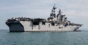 The USS Tripoli (LHA-7) America-class amphibious assault ship, transits toward Naval Station Guantanamo Bay on Aug. 3, 2020 while en route to its new homeport in San Diego, Calif. (Photo: U.S. Navy by Mass Communication Specialist 3rd Class Annaliss Candelaria/Released)