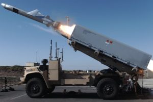 An Oshkosh Remotely Operated Ground Unit for Expeditionary (ROGUE) Fire vehicle, consisting of an unmanned Joint Light Tactical Vehicle, fired a Naval Strike Missile towards a surface target at sea during a test of the Naval Marine Expeditionary Ship Interdiction System (NMESIS) at Point Mugu Sea Range in November 2020. (Photo: U.S. Navy)