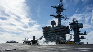 An F-35C Lightning II from Strike Fighter Squadron (VFA) 147 lands on the flight deck of Nimitz-class nuclear aircraft carrier USS Carl Vinson (CVN 70) while underway in the Pacific Ocean conducting routine operations in the U.S Third Fleet on Jan. 28, 2021. The Joint Precision Approach and Landing System (JPALS) reached initial operational capability on May 4, 2021. (Photo: U.S. Navy)