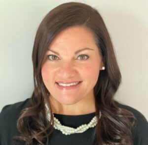Angela Ambrose , GM Defense