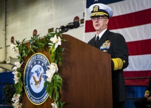 Adm. Daryl Caudle, commander of U.S. Fleet Forces Command (USFFC) delivers his personal remarks after relieving Adm. Christopher W. Grady, during the USFFC change of command ceremony aboard USS George H. W. Bush (CVN 77) on Dec. 7, 2021. (Photo: U.S. Navy by Mass Communication Specialist)