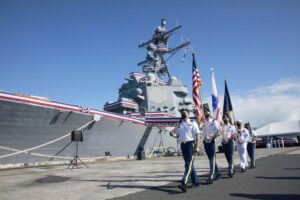 A joint Army-Navy color guard retires the colors during the commissioning ceremony of the Navy’s newest guided-missile destroyer, USS Daniel Inouye (DDG-118), homeported at Joint Base Pearl Harbor-Hickam, Hawaii on December 8, 2021. (Photo: U.S. Navy by Mass Communication Specialist 1st Class Ernesto Bonilla)