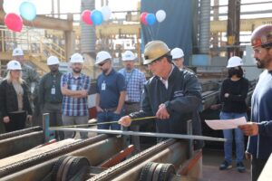 General Dynamics-NASSCO employee Dennis DuBard, the Start of Construction honoree, initiated the first cut of steel that will be used to construct the future USS Robert E. Simanek (ESB-7) Lewis B. Puller-class expeditionary sea base ship on December 1, 2021. (Photo: General Dynamics)