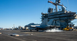 An EA-18G Growler, attached to the "Rooks" of Electronic Attack Squadron (VAQ) 137, lands on the flight deck of the Nimitz-class aircraft carrier USS Harry S. Truman (CVN 75) in the Adriatic Sea on Feb. 24., 2022 during a scheduled deployment. Russia invaded Ukraine the same day (U.S. Navy Photo)