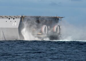 The Navy’s newest amphibious transport dock ship, the future USS Fort Lauderdale (LPD-28), loads the Navy’s newest ship-to-shore connectors, Landing Craft, Air Cushions (LCAC) 103 and 104 to their new homeport during a lift of opportunity (LOO) on July 16, 2022. (Photo: U.S. Navy)