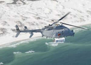 MQ-8C Fire Scout demonstrates a new mine countermeasure (MCM) prototype technology in May 2022 at Eglin Air Force Base, Florida, the Single-system Multi-mission Airborne Mine Detection (SMAMD) System optical sensor suite. (Photo: U.S. Navy).