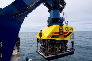 The R/V Atlantis, a U.S. Navy owned research vessel, deploys the cable-controlled Undersea Recovery Vehicle (CURV-21) off the coast of Comodoro Rivadavia, Argentina in 2017 to help the Argentine Navy search for its ARA San Juan (S-42) submarine. (Photo: U.S. Navy by Lt. Alex Cornell du Houx/Released).