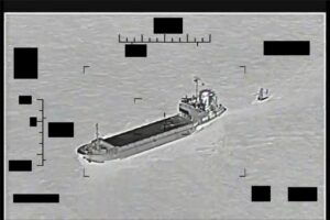 Screenshot of a video showing support ship Shahid Baziar, left, from Iran's Islamic Revolutionary Guard Corps Navy unlawfully towing a Saildrone Explorer unmanned surface vessel (right) in international waters of the Persian Gulf, Aug. 30, 2022. (Photo: U.S. Navy)