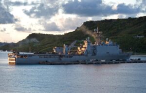 The amphibious dock landing ship USS Tortuga (LSD-46) is moored at White Beach Naval Facility during an embarkation of the 31st Marine Expeditionary Unit in August 2012. (Photo: Navy by Mass Communication Specialist 2nd Class Michael Russell/Released)