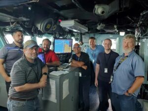 A team of engineers from Naval Surface Warfare Center, Philadelphia Division from the Program Executive Office Integrated Warfare Systems (PEO IWS) Team perform testing and evaluation of the software upgrades to the Wasp-class amphibious assault ship USS Kearsarge (LHD 3). The team is responsible for developing and testing the Navy - Electronic Chart Display and Information System (Navy ECDIS) software upgrades. (Photo: U.S. Navy by Shawn Anderson/Released)