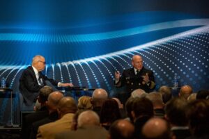 Chief of Naval Operations Adm. Mike Gilday speaks at a panel during the Surface Navy Association's 35th Annual National Symposium on January 10, 2023. (Photo: U.S. Navy by Chief Mass Communication Specialist Amanda Gray/released)