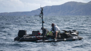 Naval Surface Warfare Center crane personnel load explosives onto a ship deployable seaborne target off the coast of San Clement Island during the U.S. Pacific Fleet's Integrated Battle Problem (IBP) 23.1 on May 3, 2023. (Photo: U.S. Navy by Mass Communication Specialist 3rd Class Derek Kelley)