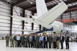 Members of the U.S. Navy and Northrop Grumman Corp. in Lake Charles, Louisiana, with the first E-6B Mercury upgraded by Northrop Grumman under the new Integrated Modification and Maintenance Contract, including Vice Adm. Carl Chebi, commander of Naval Air Systems Command; and Capt. Adam Scott, program manager for the Airborne Strategic Command, Control and Communications Program Office. (Photo: Northrop Grumman Corp. via U.S. Navy)