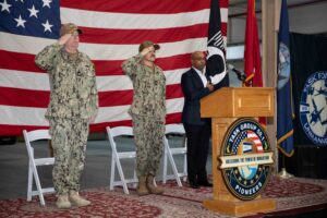 Capt. Colin Corridan, commander of U.S. Naval Forces Central Command’s Task Force 59, and Lt. Luis Echeverria, commander of Task Group 59.1, salute during a commissioning ceremony for Task Group 59.1 in Manama, Bahrain, Jan. 3, 2024. (Photo by Army Sgt. Marita Schwab)