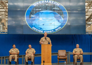 Rear Adm. Douglas Small, Commander of Naval Information Warfare Systems Command (NAVWAR) gave a speech during the Program Overmatch change of command ceremony in July 2022. (Photo: U.S. Navy by Ramon Go)