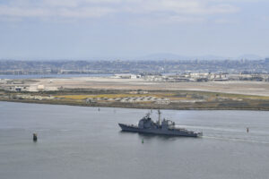 Ticonderoga-class guided missile cruiser USS Cape St. George (CG 71) arrives at the mouth of San Diego Bay, April 22, 2025. Cape St. George, previously based at Everett, Wash., completed her homeport change to Naval Base San Diego. (U.S. Navy photo by Mass Communication Specialist 1st Class Kelby Sanders)
