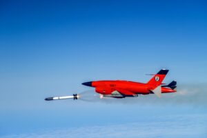 A BQM-34 unmanned aerial target, which is remotely piloted during flight, releases a test missile over the Point Mugu Sea Range. The test advanced a missile design aimed at improving range and targeting for future Navy missions. (U.S. Navy photo)