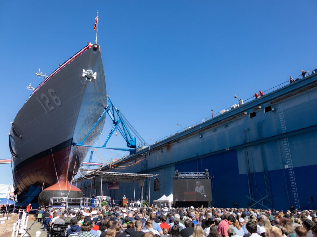 The Navy and General Dynamics Bath Iron Works hosted a christening ceremony for the future USS Louis H. Wilson Jr. (DDG-126) on Sept 27, the company’s first Arleigh Burke-class Flight III destroyer. The Flight III variant is designed to accommodate the ANSPY-6(V)1 Air and Missile Defense Radar. (Photo: General Dynamics)