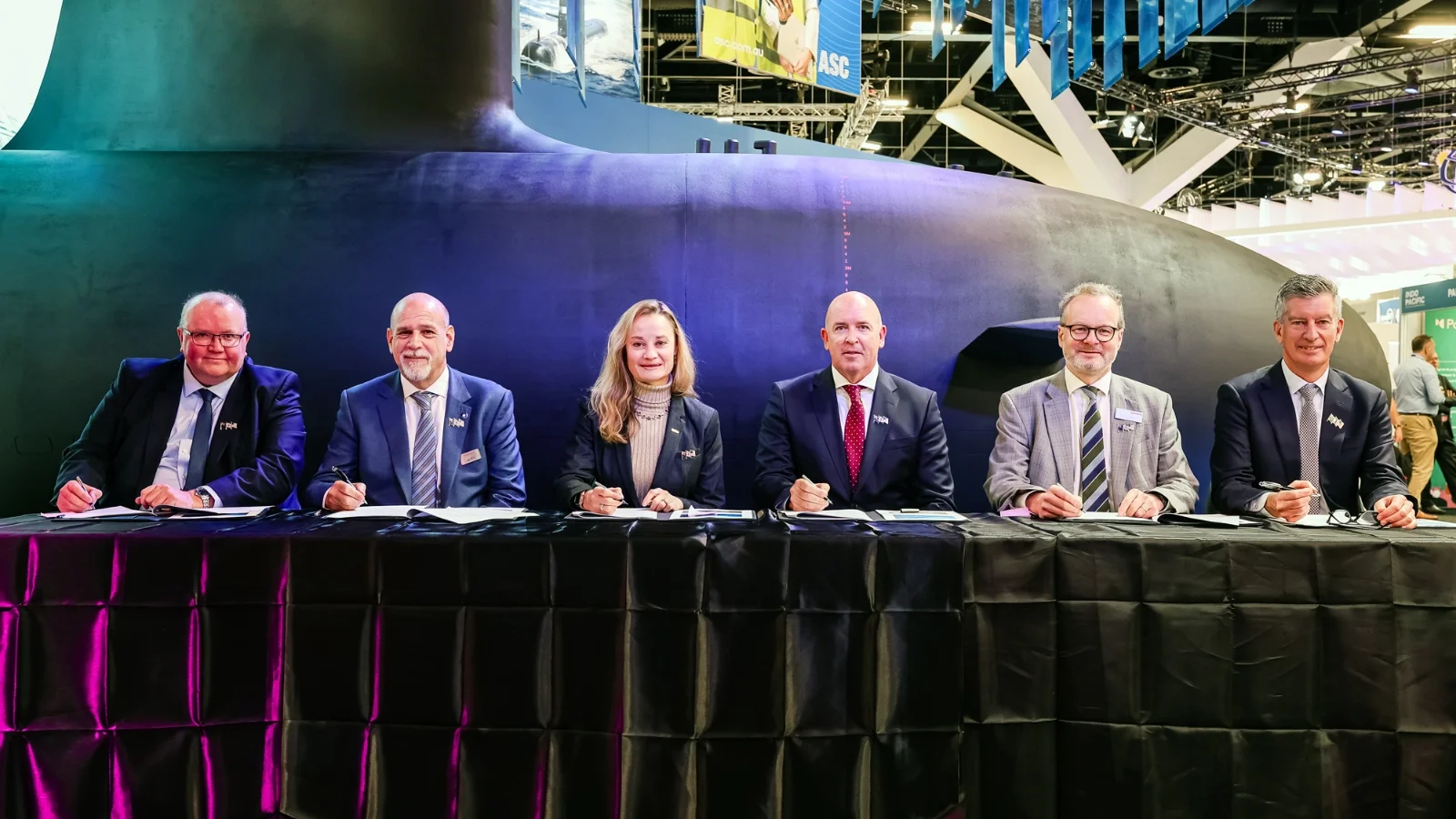 Executives from BAE Systems, RTX’s Raytheon Australia, General Dynamics Mission Systems Thales on Nov. 5 signed a Memorandum of Understanding (MoU) pitching the establishment of a unified submarine combat systems collaborative team for the future UK and Australian attack submarine, SSN-AUKUS. (Photo: BAE Systems)