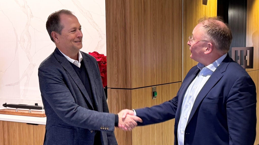 Chris Kastner, HII president and CEO and Babcock CEO David Lockwood meet at HII’s corporate office in Arlington, Va. on Dec. 5, 2025, to discuss current and future collaboration opportunities that could enhance technological innovations and maximize production efficiency. (Photo: HII).