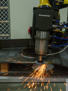 GrayMatter Robotics technology performing autonomous grinding to an HII foundation project that utilized internal research and development funds. HII is partnering with GrayMatter to explore and develop surface treatment, blast, and coat capabilities for U.S. Navy application. (Photo: GrayMatter Robotics)