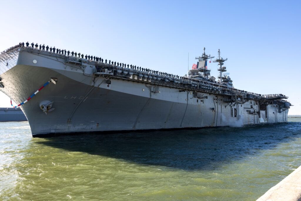 The USS Wasp (LHD 1) amphibious assault ship travels toward the pier at Naval Station Norfolk on Dec 6, 2024. Following a seven-month deployment. (Photo: U.S. Marine Corps by SSgt. Servante R. Coba)