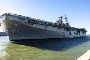 The USS Wasp (LHD 1) amphibious assault ship travels toward the pier at Naval Station Norfolk on Dec 6, 2024. Following a seven-month deployment. (Photo: U.S. Marine Corps by SSgt. Servante R. Coba)