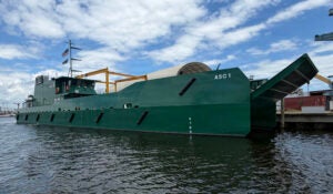 An Ancillary Surface Craft (ASC) docked in Bayou La Batre, Ala. on Aug. 3, 2026. The ASC is being developed through U.S.-Australian industry collaboration to support experimentation and inform future amphibious modernization. (Photo: Marine Corps Warfighting Laboratory, Emily Carrol)